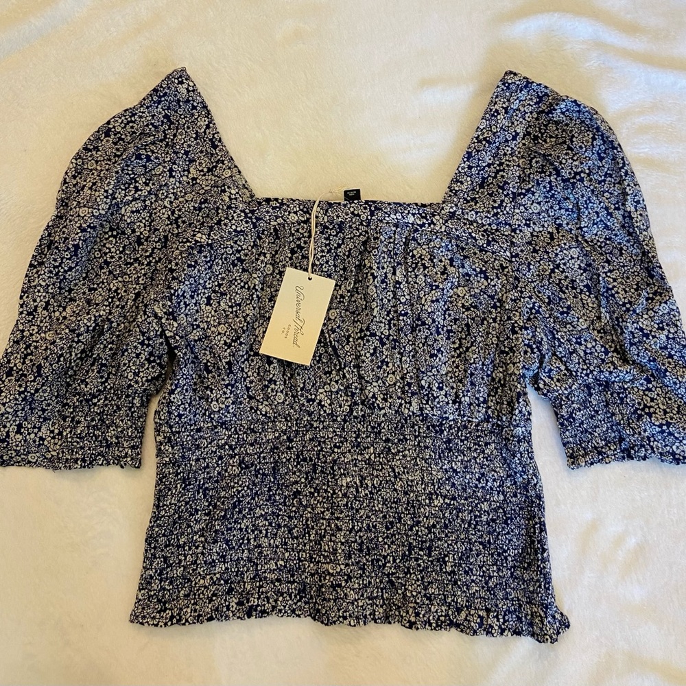 Blue and white floral blouse